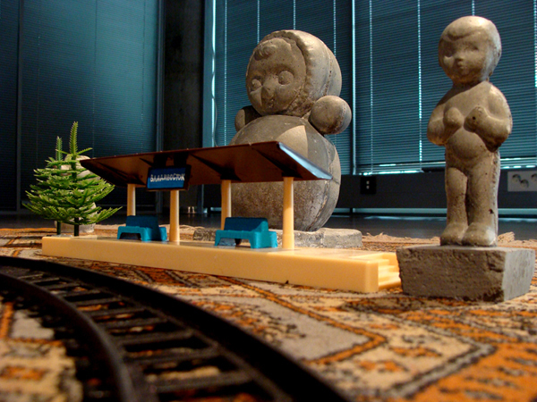 "The circle of the Past, Present and the Power". Installation: concrete, toys, carpet. 2010